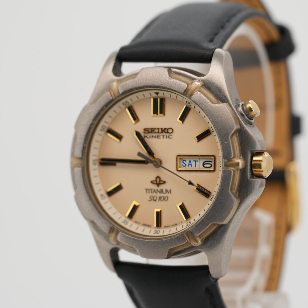 Vintage Seiko Kinetic Titanium SQ 100 Day-Date 38mm Men's Watch 5M43-0C00 – Runs
